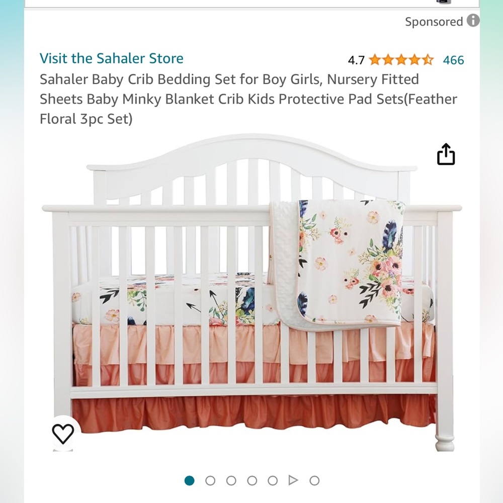 Feather and flower boho crib set by Sahaler.
